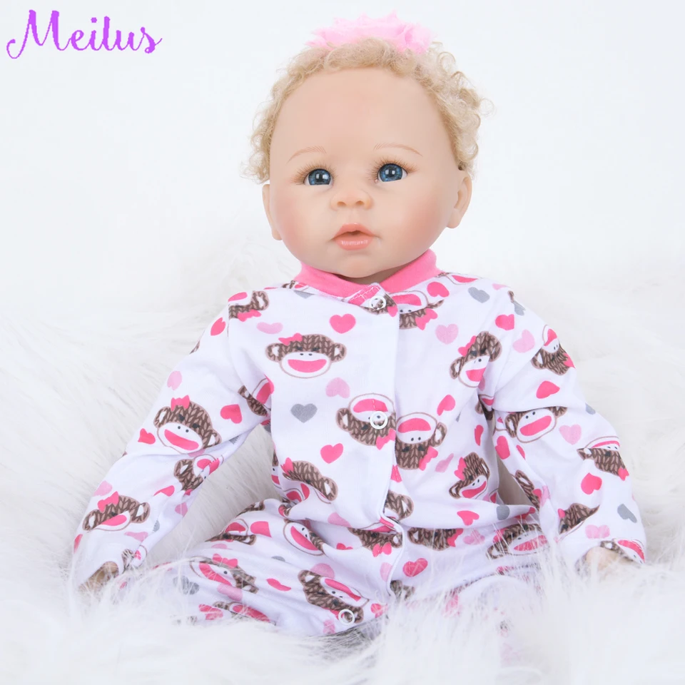 muñeco bebe ojos grandes