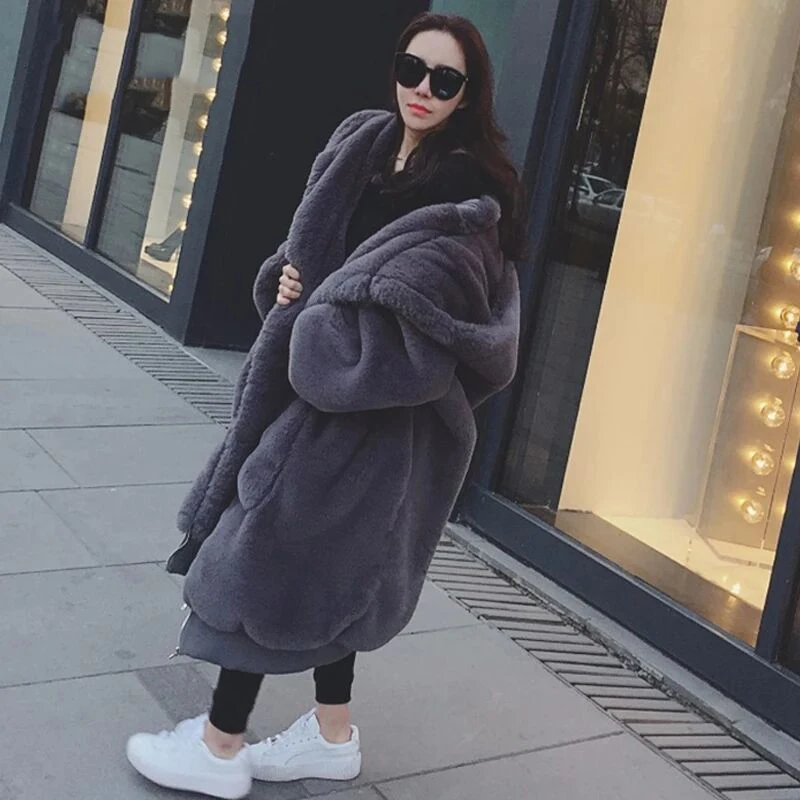

Super winter warm hooded large size long solid color imitation leather coat 2018 new casual long-sleeved women's fur coat
