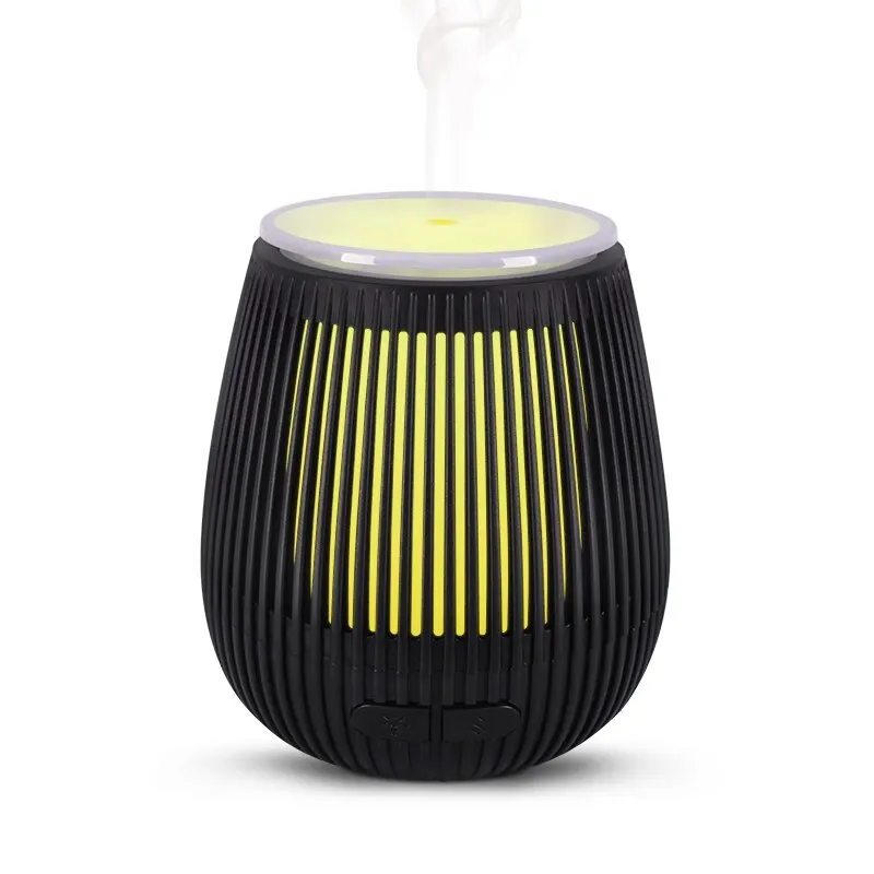 

Ultrasonic Humidifier Aromatherapy Essential Oil Diffuser For Home Hollow with LED Light