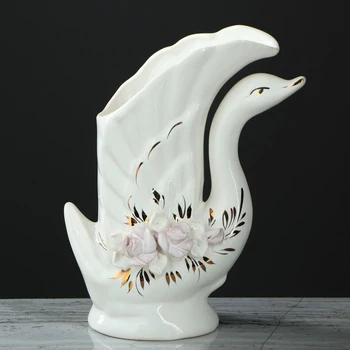 

Table vase "Swan" gold decor, molding, white, 19 cm