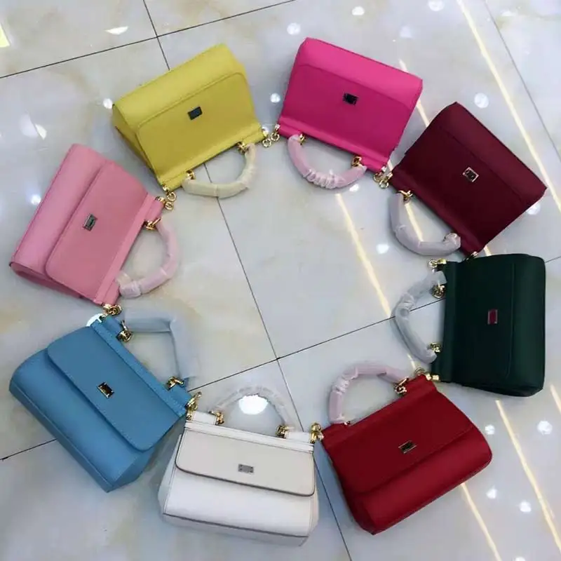 

Early autumn new fashion palm print imported cowhide hand shoulder bag with small mirror candy color medium code