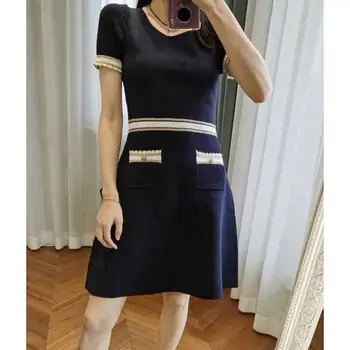 

2020 Spring and Summer New Contrasting Color Lady Temperament Gold Lines Metal Buckle Slim knitted Dress