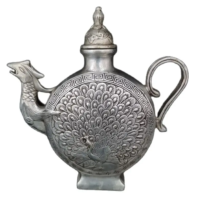 

Chinese Old Tibet Silver Carving Peacock Shaped Wine Pot