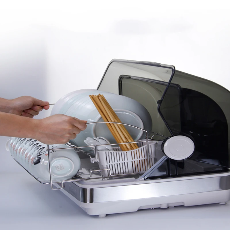 

Disinfecting cabinets with tabletop kitchen bowls and cabinets sterilized and dried with wate