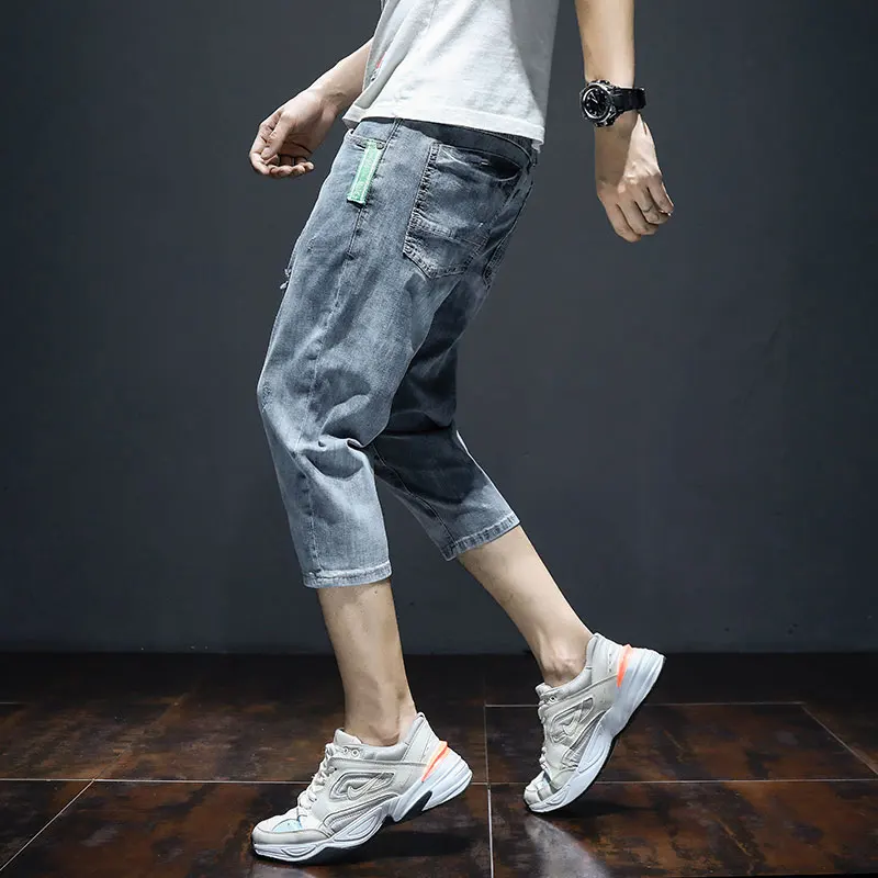 

Korean Style Men Baggy Ripped Jeans Man Blue Straight Stretch Jean Calf-Length Pants 2020 Fashion Summer Distressed Short Denim