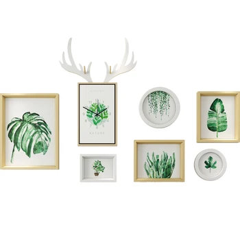 

Nordic wind green plant photo wall photo frame wall combination simple living room sofa background wall deer head clock