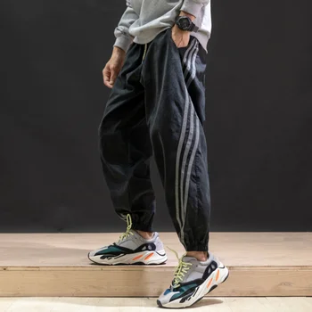 

Men's Casual Sports Pants Japanese Large Size Loose Stripes Decorative Casual Trousers Korean Version of The Trend of Beam Pants