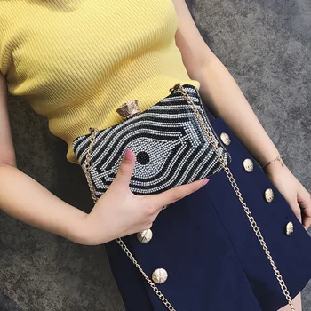 

Handbag lady 2019 new lady leisure drilling creative eyes pearl decorative chain oblique Bag