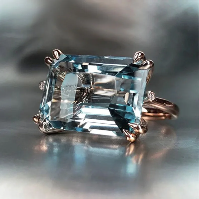 VAGZEB Solitaire 4 Claw Sky Blue Band Ring for Women Romantic Rose Gold Color Horizontal Rectangular Shape Fashion Girl Rings