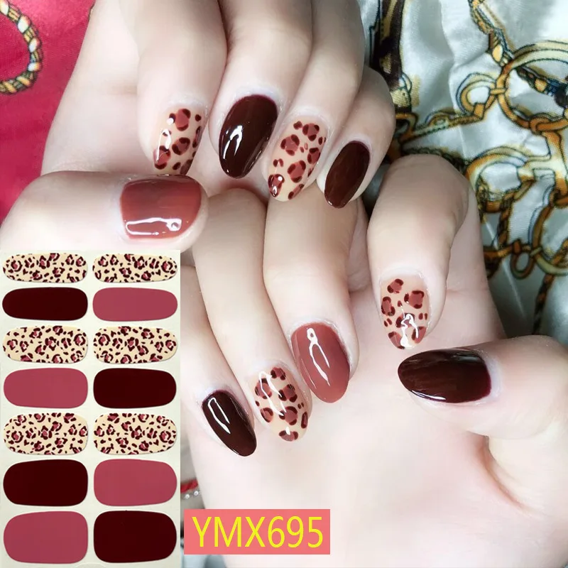 Leopard Nail Art. Nail Polish Stickers with Animal Print Stock Photo by  ©casther 53476359