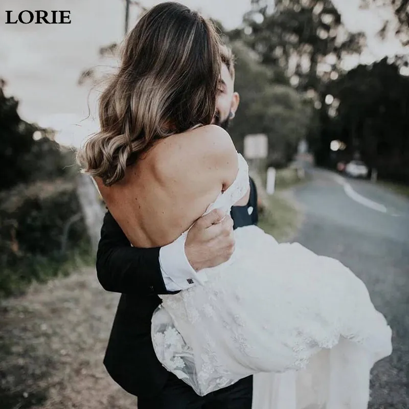 graceful-lace-appliques-off-shoulder-wedding-dresses-backless-tulle-a-line-boho-beach-plus-size-wedding-gowns-robes-de-mariée (1)