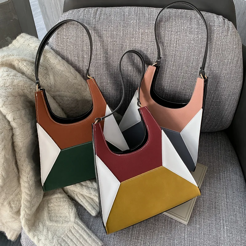 

2020 Autumn Online Celebrity Celebrity Style Dull Polish Contrast Color Joint Triangular Retro Armpit Shoulder Bag U-Shaped Hand
