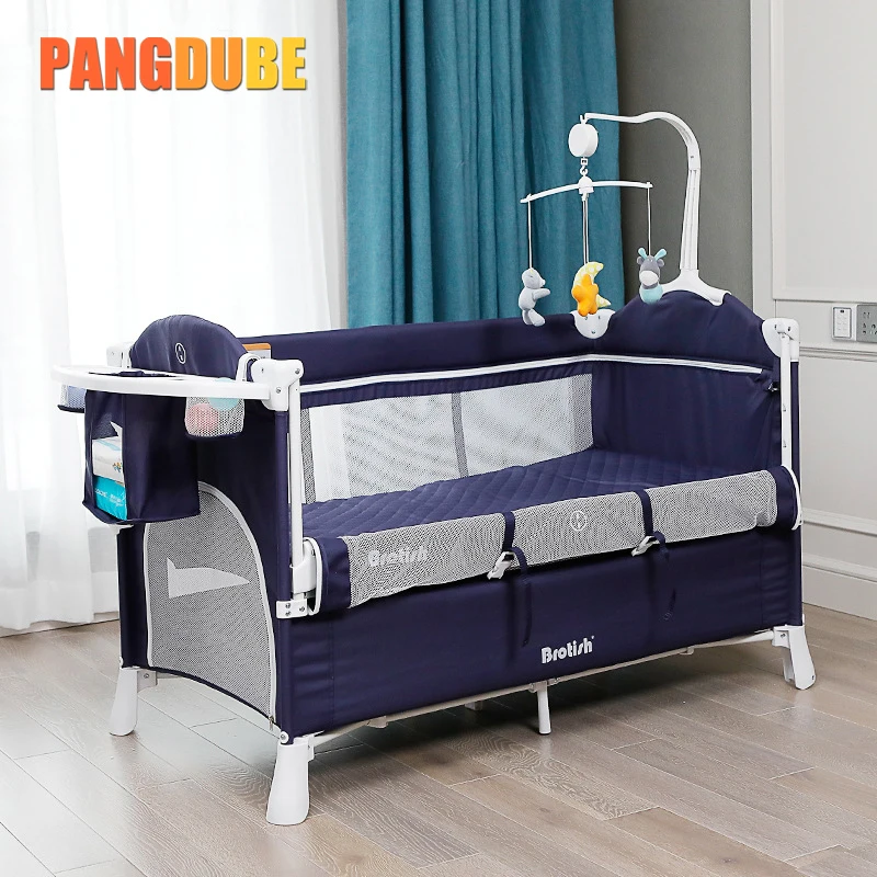 baby bed beside bed