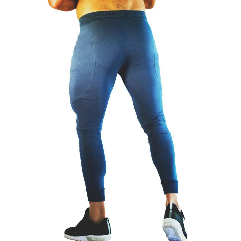 Cena Wysokiej jakości marka jakości spodnie Fitness dorywczo elastyczne spodnie odzież sportowa do kulturystyki Casual granatowy wojskowe spodnie dresowe spodnie joggery