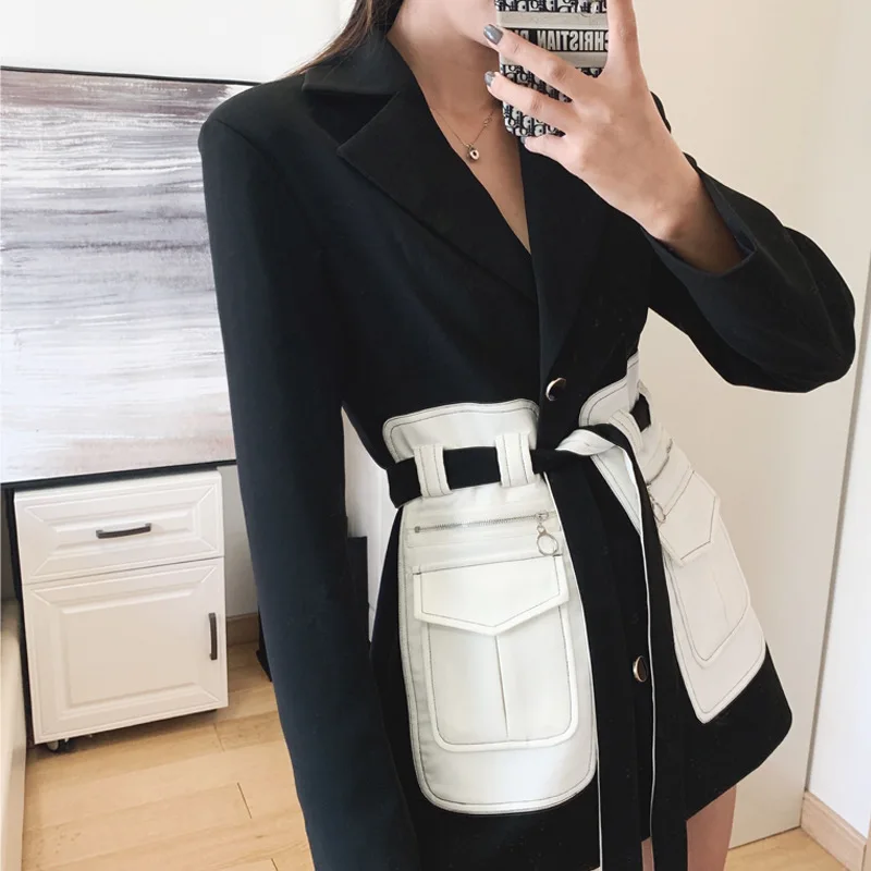 

2019 autumn and winter new black and white color matching tooling wind pocket niche design long suit jacket female