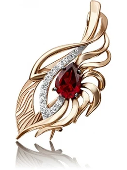 

Yuz platinum brooch with garnet and Topaz in red gold