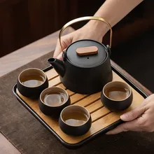 Teiera in ceramica nera in stile giapponese Set da tè in teiera una pentola quattro tazze con borsa Kungfu Set da tè per la casa articoli da tè da viaggio per ufficio buoni regali
