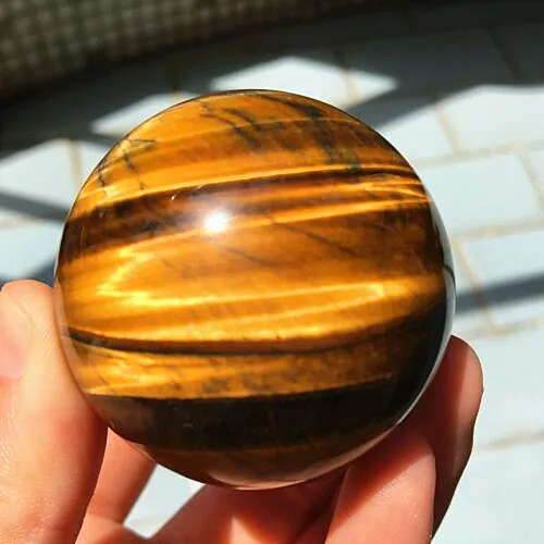 

Natural quartz crystal tiger eye quartz crystal ball Rock healing.Sculpture. Square point. Home decoration