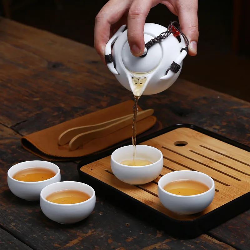 

Chinese Kung Fu Ceramic Teapot Cup Coffee Cup Gift Travel Portable Tea Set, very suitable for use in the office or living room.