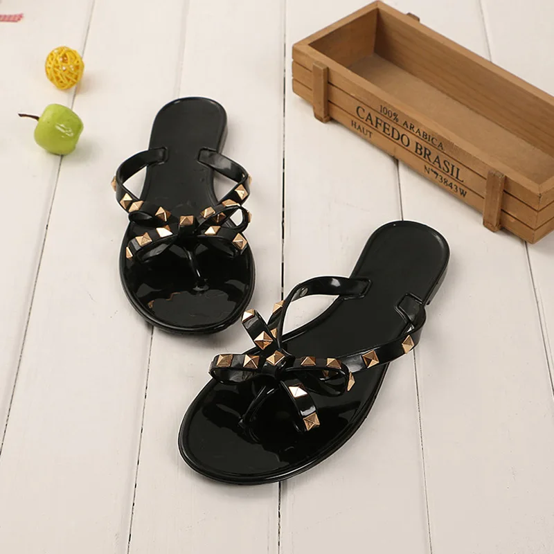 

2019 Summer new Women's shoes sandals and slippers Flat with bow rivets slippers Flip-flops Garden jelly beach sandals