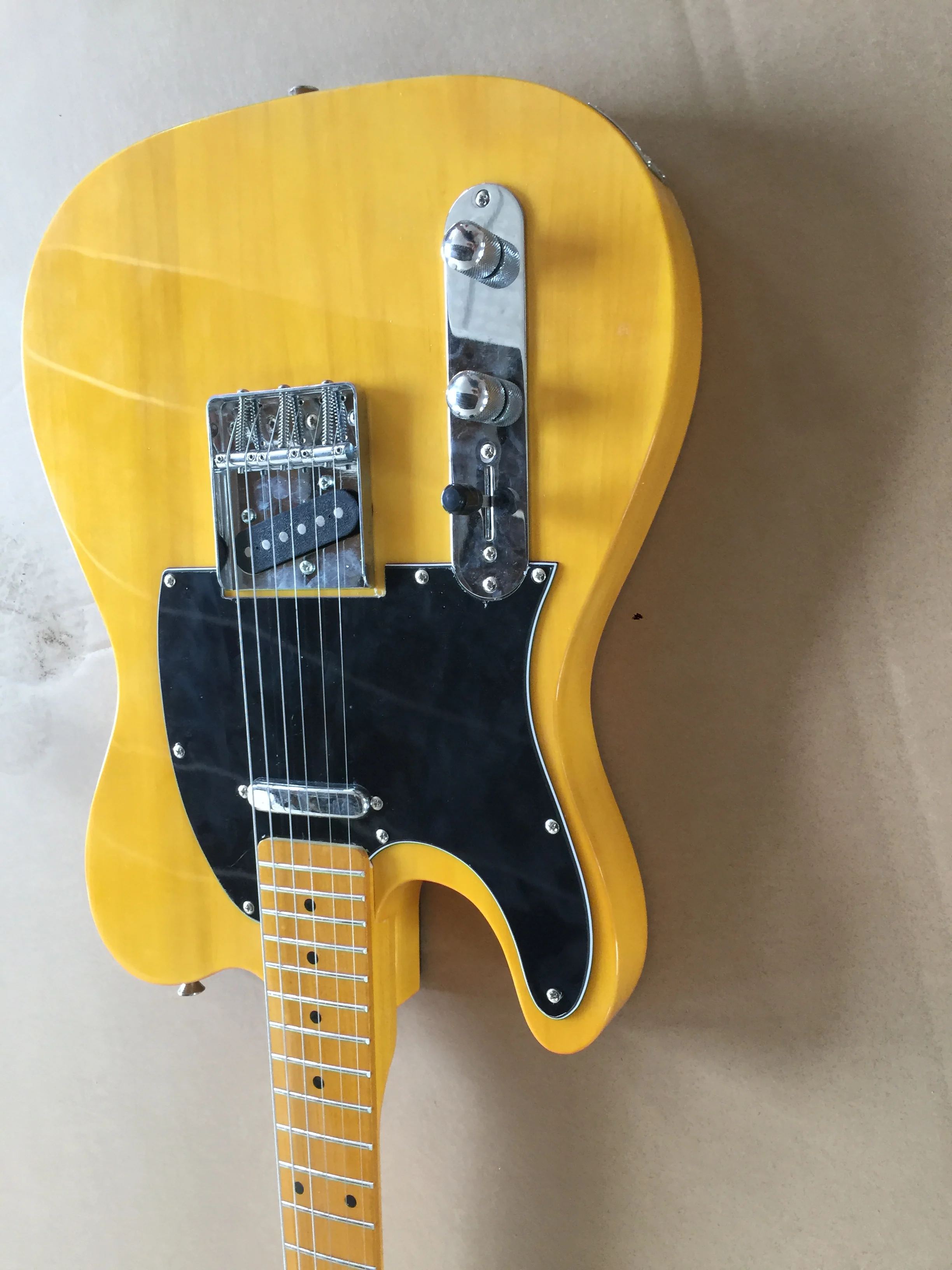 

Electric guitar/left-handed transparent yellow beautiful high-quality guitar/anmiyue customizable Chinese electric guitar