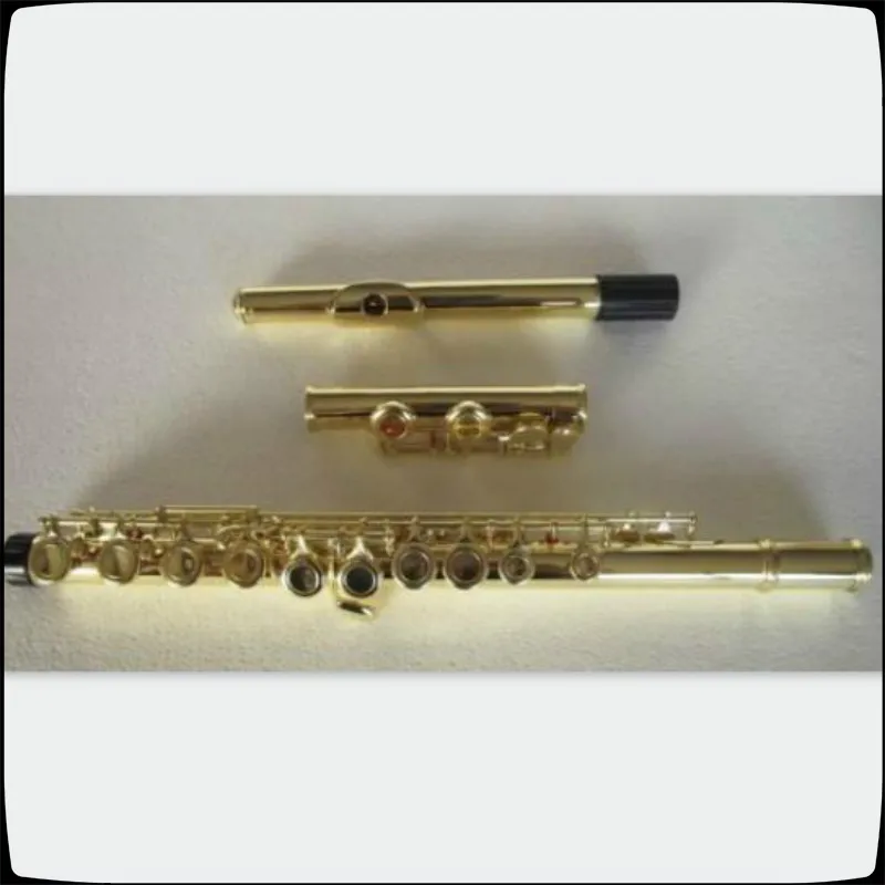 

brand new Gold plated 16 key closed hole flute C tune +E key