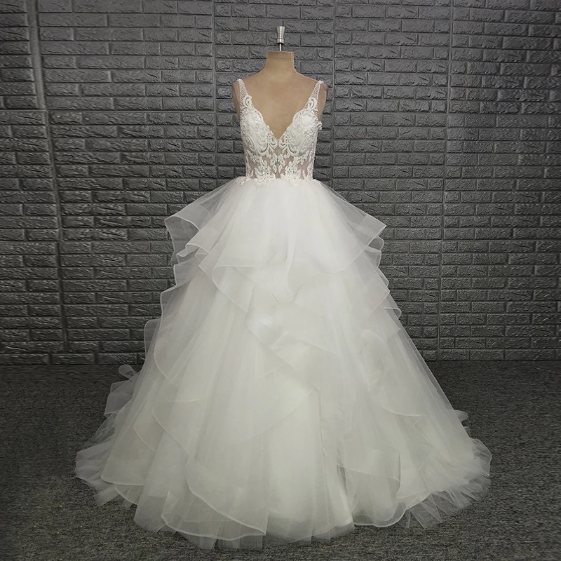 

2020 Sheer Straps V Neck Open Back Ruffles Beaded Ball Gown Wedding Dress