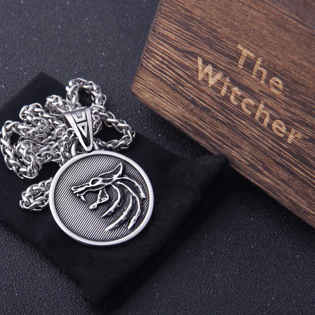 the Wizard wolf head pendant necklace for Geralt with a The Wild Hunt 3 Figure TV as photo show