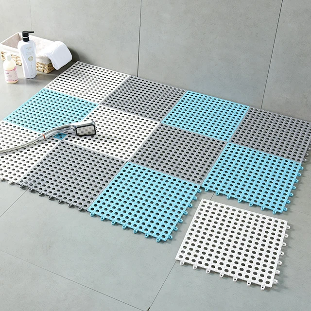 Rectangular rubber tub shower mat with blue heart suckers