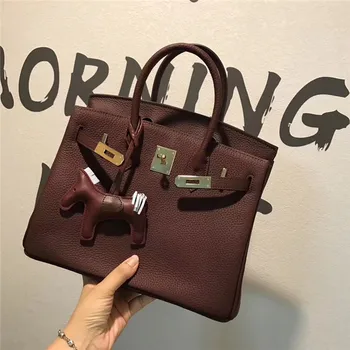 

Leather women's bag fashion bag lychee grain top layer leather hand-held Single Shoulder Messenger Bag