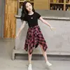 blackteeplaid skirt