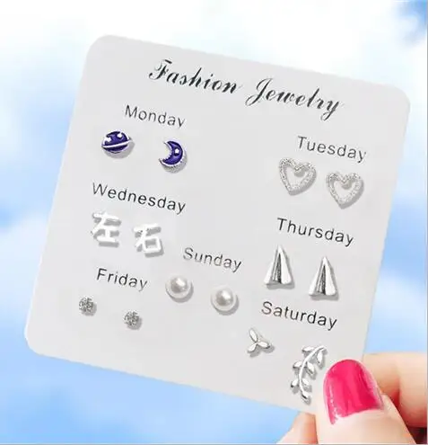 

e 1404 Korean version of the fashion cute sweet net red paragraph week set card earrings female jewelry accessories factory dire