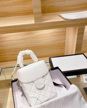 

Fashion temperament fashion brand chain lady big brand star party bag banquet bag bucket bag Single Shoulder Messenger