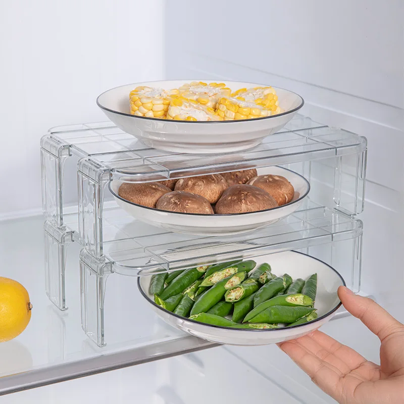 https://ae01.alicdn.com/kf/H96866348030e42898a6f230ec99ff7bfl/Refrigerator-leftovers-Layered-Storage-Rack-For-Kitchen-Cabinets-Divider-And-Organizer-Transparent-Home-Desktop-Storage-Racks.jpg