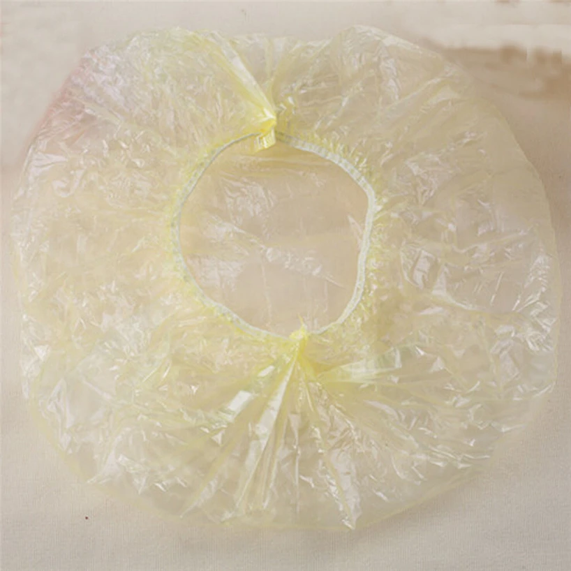 100 transparent plastic shower caps waterproof and dustproof for spa salon Durable practical and convenient household items
