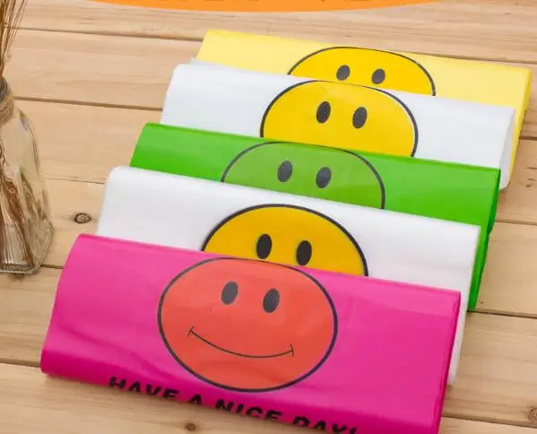 

100pcs Carry Out Bags Smile Gift Bag Retail Supermarket Grocery Shopping Plastic Bags With Handle Food Pouch