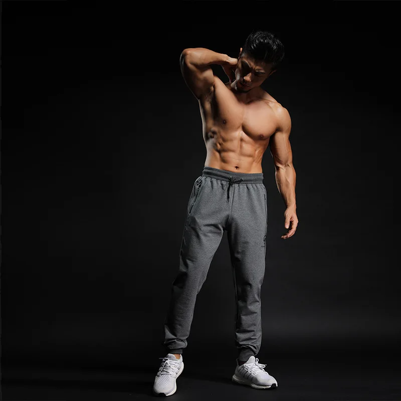 

Muscle Aesthetics Fitness Sports Casual Running Trousers Reflective Strips Skinny Pants