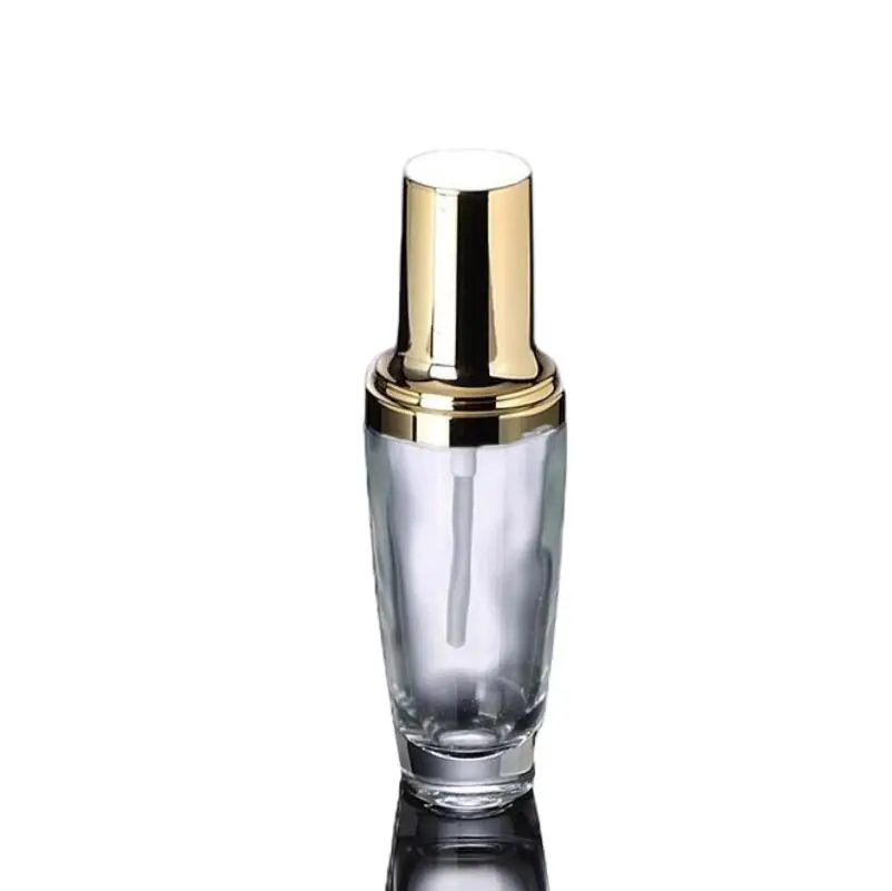 

30ML transparent glass bottle with golden press pump for serum/lotion/foundation/emulsion Cosmetic Packaging