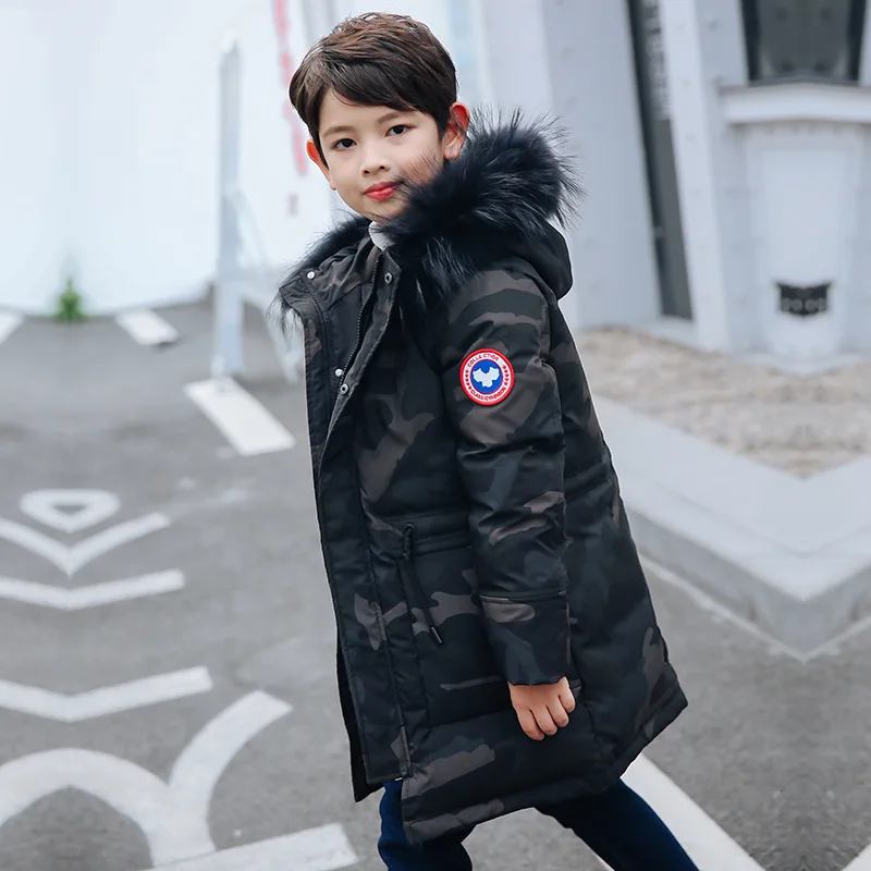 

New children's down jacket boys winter fashion thickening camouflage hooded long section warm jacket in the big boy casual coat