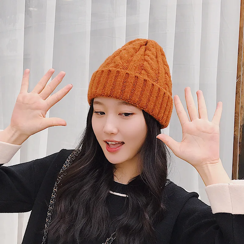New trend hat wool hat Korean version of the wild outdoor thick warm knitted hat pure color twist hat