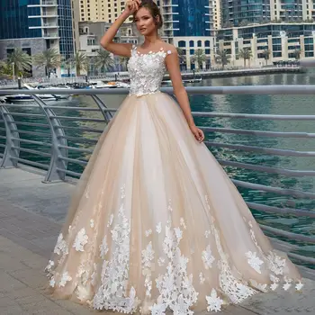 

2020 Sheer Illusion Champagne Ball Gown Wedding Dresses Lace Applique O Neck Bridal Gown