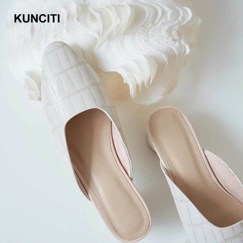 KUNCITI Designer Slippers Embossed Genuine Leather Low Heel Mules Outside Runway European Newest Shoes Fashion Online T002