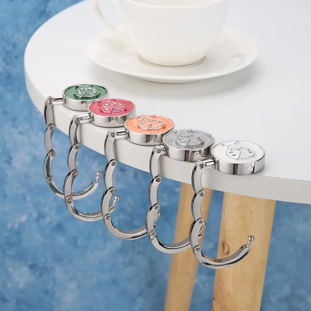 

Scarab Shape Rhinestone Foldable Purse Handbag Hanger Hook Holder Bag Table Small and Portable Delicate Handbag Table Hook