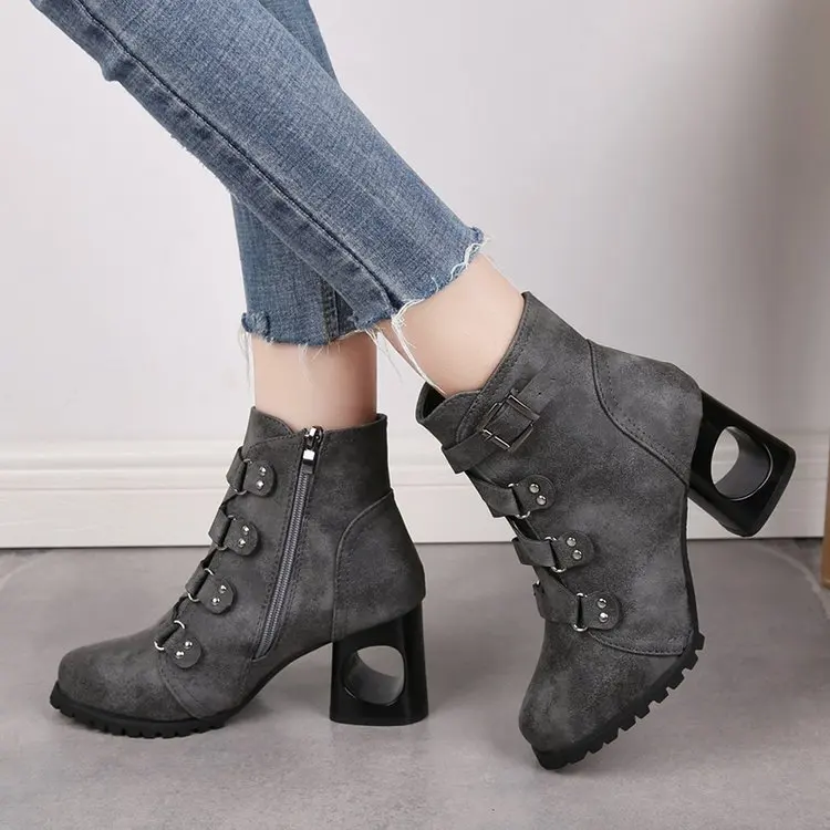 Martin boots women's thick heel winter new large size high heel belt buckle rivet short boots explosion models women's shoes.