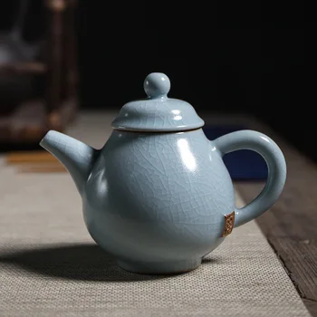 

Boutique Ru Tea Pot Gracked Glaze Tea Set Tea Pot with Filter Italics Ru Kiln Kettle Tea Pot Tea Set Siteel Ceramic Tea Pot