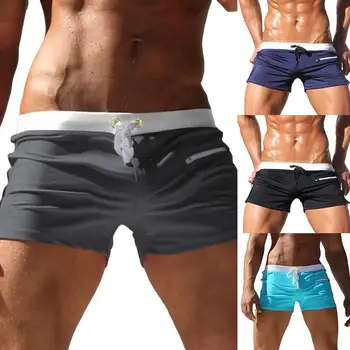 

Men Board Shorts Solid Color Swimming Trunks Drawstring Pockets Slim Fitted Beach Shorts Swimwear