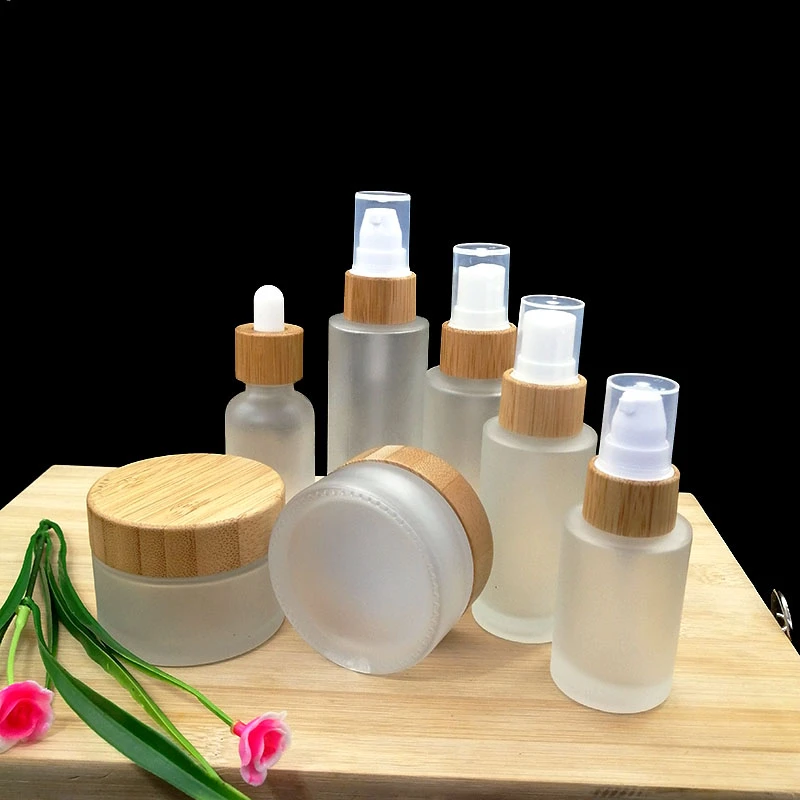 Download 50pcs Frosted Glass Cosmetic Container Emulsion Spray Pump Empty Bottle Cream Jar With Eco Friendly Wood Bamboo Cap Pipette Lid Refillable Bottles Aliexpress