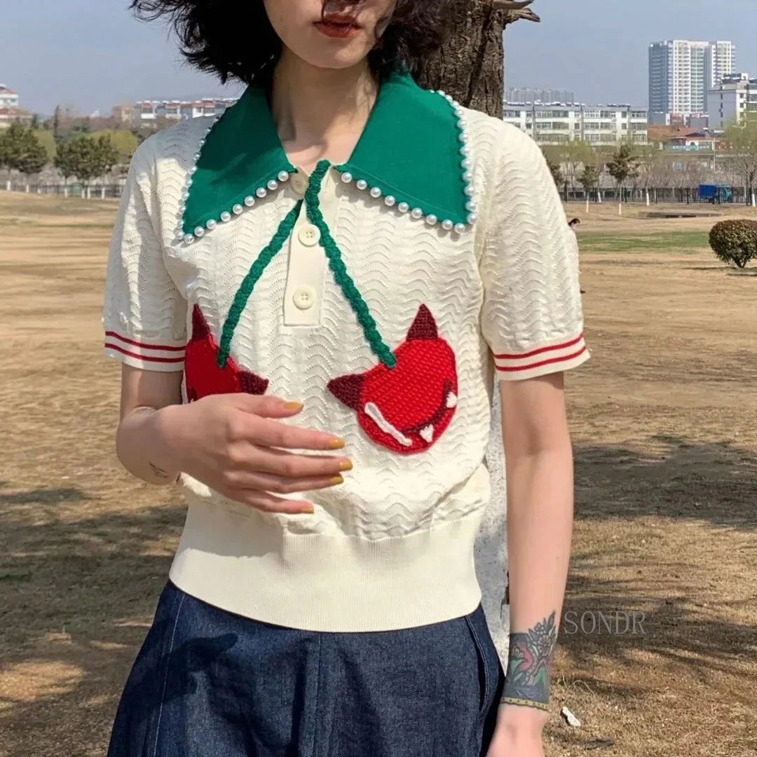 

2021 Summer Tops Green Beaded Polo Collar Cherry Embroidery White T Shirt Women Hollow Out Knitted T Shirt Short Sleeve Shirts