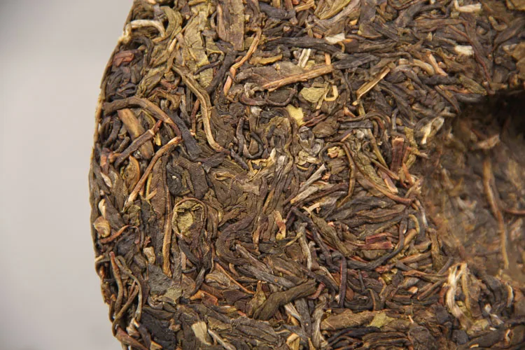 Menghai Early Spring Raw Pu-erh Nannuo Mountain Qizi Tea Cake 357g Shen Pu'er Tea