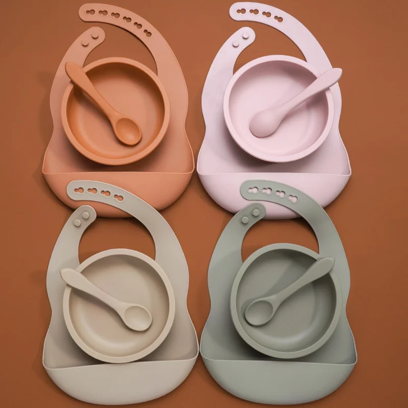 

New Product Waterproof baby bibs Solid color Infant Saliva Towel Food Grade Silicone Toddler Plate and Feeding Spoon For Kids